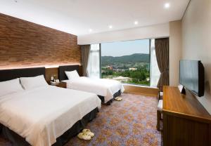 TV a/nebo společenská místnost v ubytování The K Hotel Gyeongju