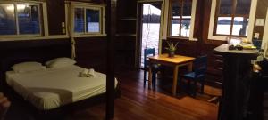 En eller flere senge i et værelse på casa frisas del mar