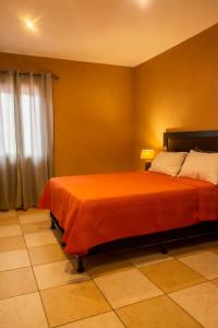 Postel nebo postele na pokoji v ubytování Casa Vista Baúl