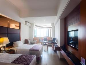 Et tv og/eller underholdning på Ming Yang Hotel