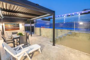 En balkon eller terrasse på The Margalit Suite - Gesher Haziv