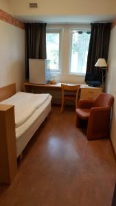 Postel nebo postele na pokoji v ubytování Hotell Sport & Rest
