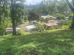an aerial view of a house in a field at GOROKA Home Stay in Goroka