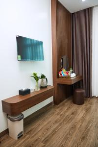 Et tv og/eller underholdning på Hotel Lâm Anh 35