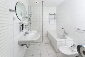 Koupelna v ubytování Hanse Hotel