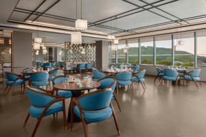 En restaurant eller et andet spisested på Le Méridien Shanghai Sheshan