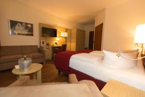 Postel nebo postele na pokoji v ubytování Hotel Kreller