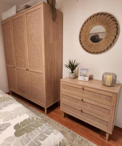 En eller flere senge i et værelse på Apartment Olivia