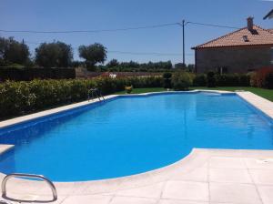 Bazén v ubytovaní Casa do Lagar de Tazem alebo v jeho blízkosti