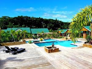 an image of a resort with a swimming pool at Orator Hotel in Siusega