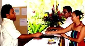 a group of people shaking hands at a table at Orator Hotel in Siusega +162 photos