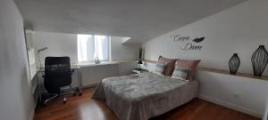 En eller flere senge i et værelse på Maison tout confort 6 personnes - 3 chambres -