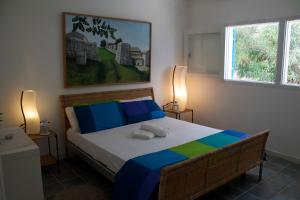 Posteľ alebo postele v izbe v ubytovaní Villa Porto Ulisse