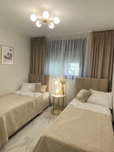 Giường trong phòng chung tại Flamenca Village- Apartment Fabiola +20 ảnh