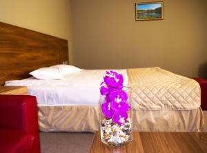 Cama ou camas em um quarto em Hotel Calipso Hotel
