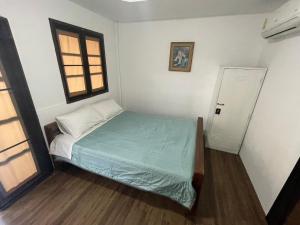 Postel nebo postele na pokoji v ubytování Banpakan homestay