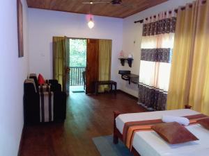 En eller flere senge i et værelse på Peek & Pick Garden resort + 25 billeder