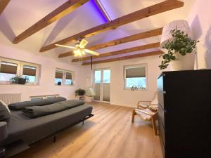 Posezení v ubytování Modernes & zentral gelegenes Ferienhaus mit Garten und Parkplatz