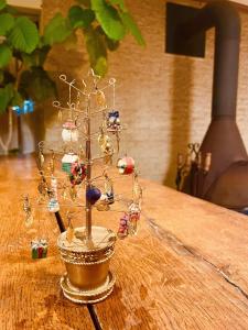 a miniature christmas tree on a wooden table at hayama satoyado in Hayama