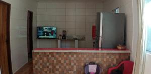 Køkken eller tekøkken på Casa térreo na ilha + 2 billeder