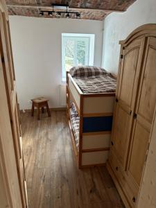 Giường trong phòng chung tại Apartment Polubny