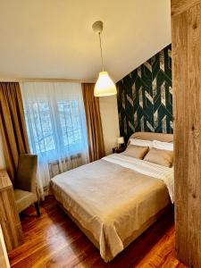 En eller flere senge i et værelse på Vikend kuća Planinski raj