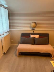 Khu vực ghế ngồi tại Maison proche centre-ville et Futuroscope