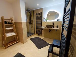 a bathroom with a sink and a shower at Harzer Bergstadthaus für Familien und Freunde in Sankt Andreasberg +79 photos
