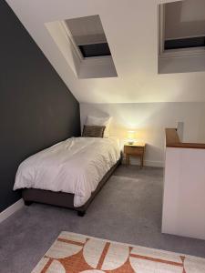 En eller flere senge i et værelse på Stylish apartment near Amsterdam + 14 billeder