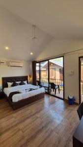 En eller flere senge i et værelse på Molly's Nest