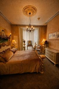 Postel nebo postele na pokoji v ubytování The Mirador Boutique Town House + 121 fotografií