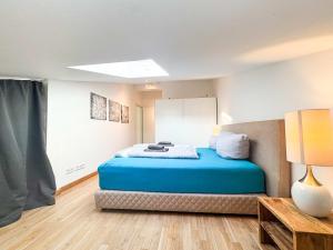 Postel nebo postele na pokoji v ubytování Eiswerder - Inselwohnung in der Havel mit Balkon