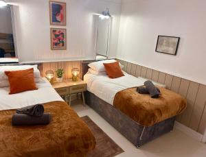 Postel nebo postele na pokoji v ubytování Churchill Apartment- 4 Beds- Free Parking- Near NEC BHX & HS2