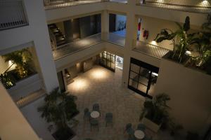 an overhead view of a building with tables and plants at Alpirious in Islamabad