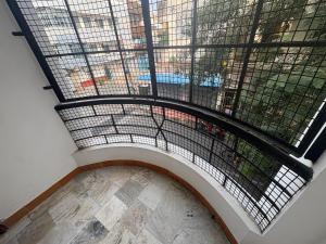 an overhead view of a building with a metal ceiling at Varson Stay in Pondicherry