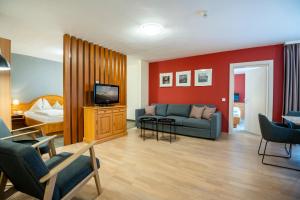 Et opholdsområde på Arkadia Apartments + 9 billeder