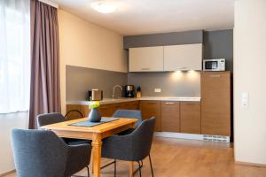 Køkken eller tekøkken på Arkadia Apartments