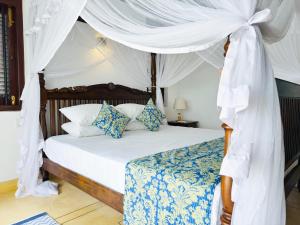 Postel nebo postele na pokoji v ubytování Thalpe Serenity Shore + 20 fotografií