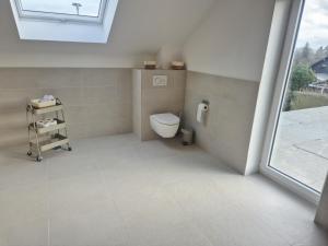 Koupelna v ubytování Ferienhaus Valle Verde in Kall-Steinfeld + 11 fotografií