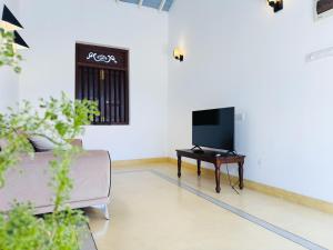 TV a/nebo společenská místnost v ubytování Thalpe Serenity Shore