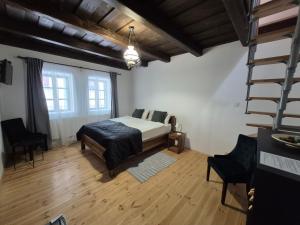 Giường trong phòng chung tại NeuHaus Apartman