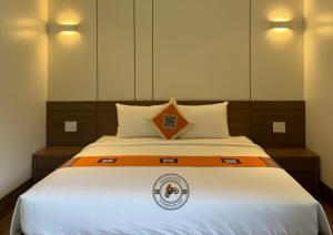 Postel nebo postele na pokoji v ubytování Ha Giang Hostel