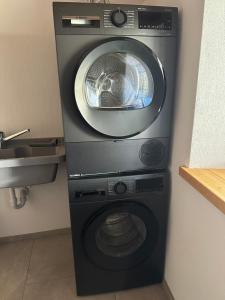 Billede fra billedgalleriet på New loft apartment with mountain views i Alvaneu