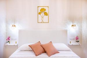 Giường trong phòng chung tại Ginevra Luxury Taormina