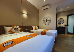 Giường trong phòng chung tại Ha Giang Hostel