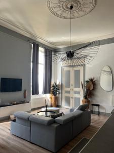 Et opholdsområde på Appartement au Palais - WIFI