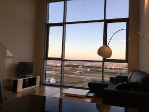 Et tv og/eller underholdning på Panoramic Suites By VALENCIAFLATS EU