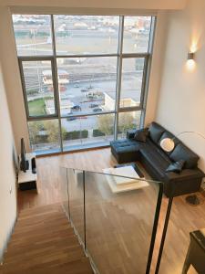 Et opholdsområde på Panoramic Suites By VALENCIAFLATS EU + 7 billeder