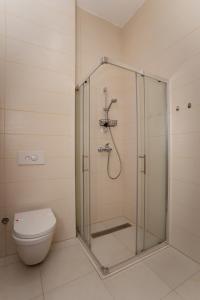 Phòng tắm tại Green Apartments Bjelašnica +28 ảnh