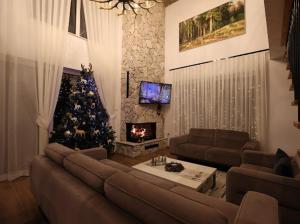 Posezení v ubytování De La Villa Brezovice